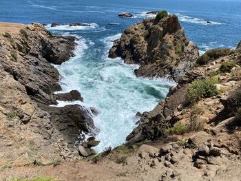 High angle view of rocks on shore