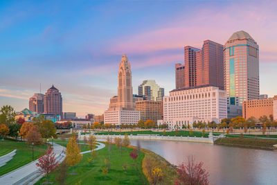 Modern buildings in city against sky