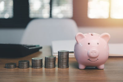 Close-up of coins on table