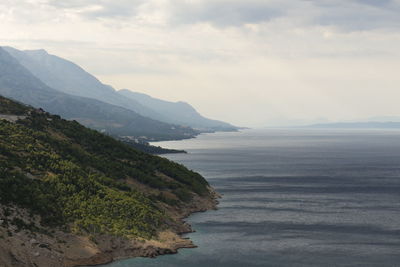 High angle view of coastal feature by calm sea