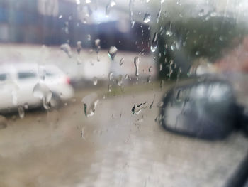 Wet glass window in rainy season