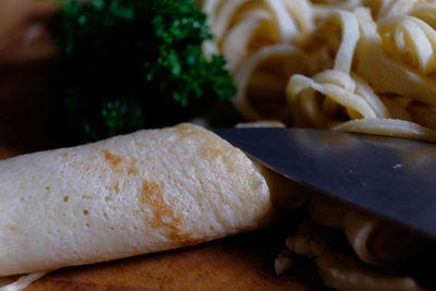 Close-up of bread on cutting board