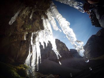 Low angle view of rock formation in sea