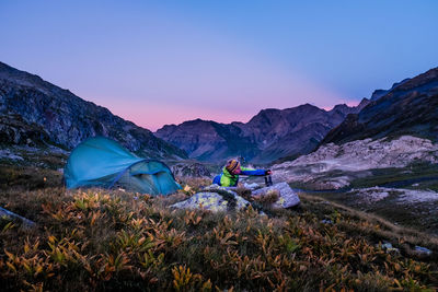 Scenic view of mountains against sky during sunset