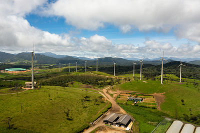 Wind turbines farm in the mountains. windmills for renewable electric energy production. 