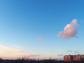 Cityscape against blue sky