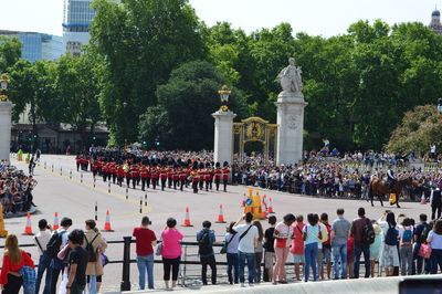 Troops parading outside buckingham palace