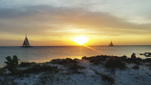 Scenic view of sea against sky during sunset
