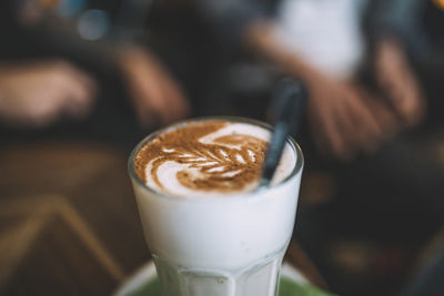 Close-up of cappuccino on table