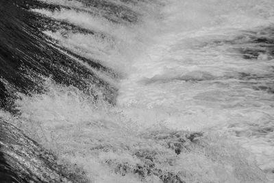 Waves splashing on rocks