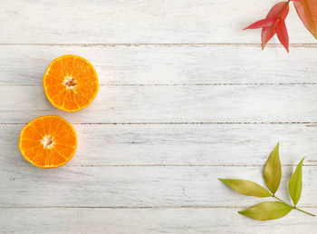 High angle view of orange fruits on table