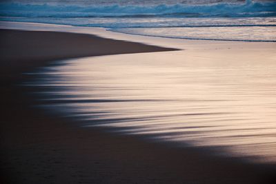 Scenic view of beach during sunset