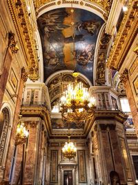 Low angle view of illuminated ceiling of building