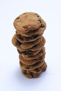 Stack of cookies against white background