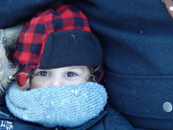 Portrait of cute girl in snow