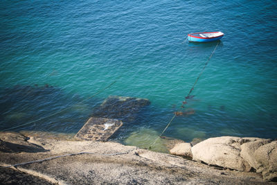 High angle view of rock in sea