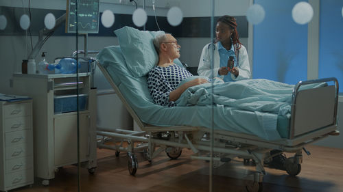 Doctor examining patient at hospital