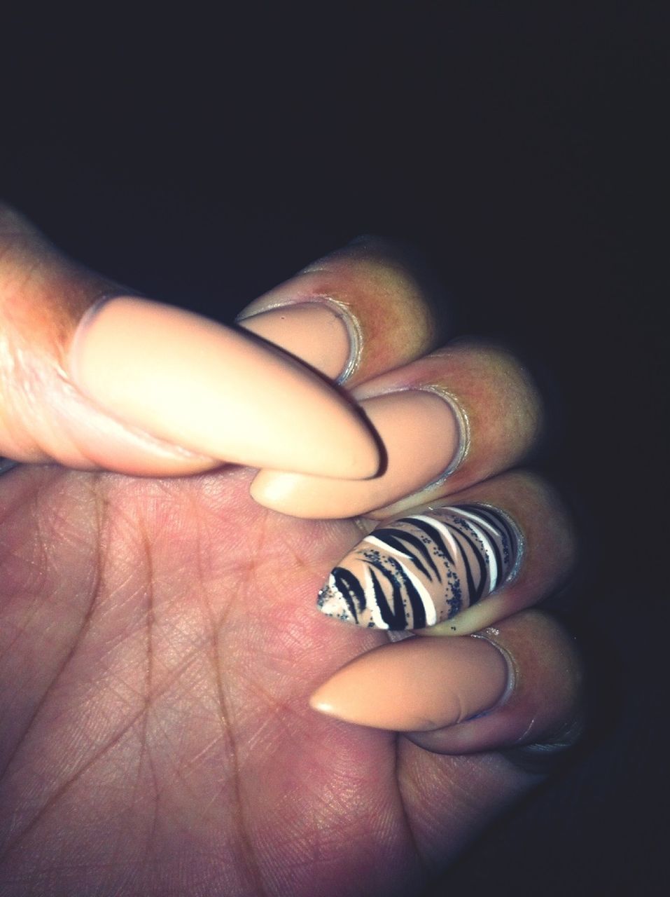 person, part of, human finger, close-up, indoors, holding, studio shot, cropped, personal perspective, black background, unrecognizable person, showing, creativity, ring, palm, single object