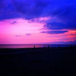 Scenic view of sea at sunset