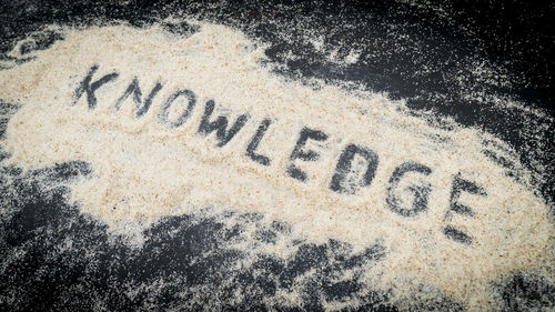 Close-up of text on snow