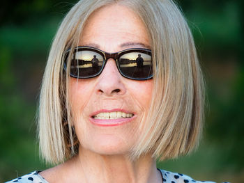 Close-up of young woman wearing sunglasses