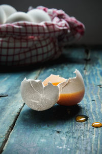 Close-up of eggshell on table