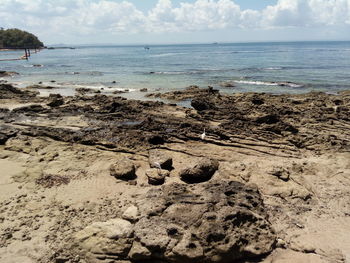 Scenic view of beach against sky