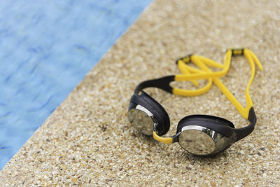 High angle view of yellow umbrella on beach