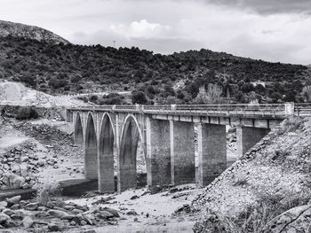 Bridge over river against sky