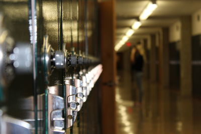 Close-up of lockers in illuminated corridor