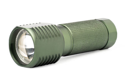 Close-up of camera over white background