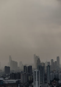 Modern buildings in city against sky