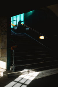 High angle view of illuminated staircase in building