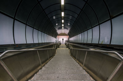 High angle view of person standing by staircase at subway station