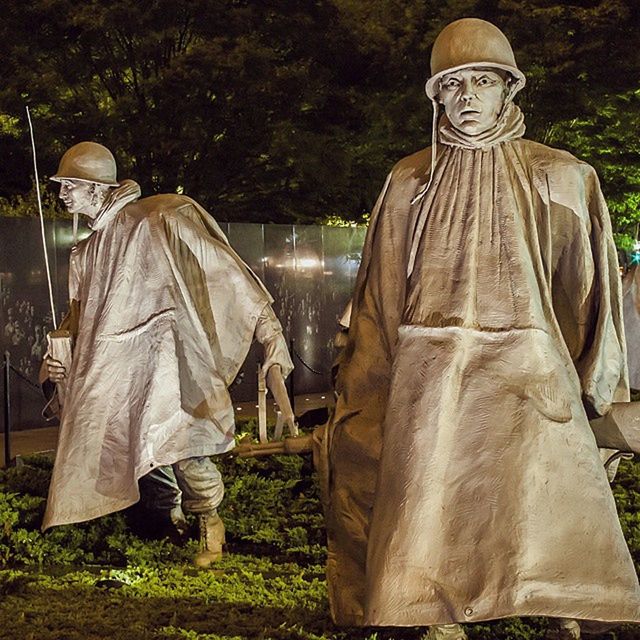 statue, men, sculpture, human representation, standing, rear view, outdoors, religion, park - man made space, day, casual clothing, lifestyles, spirituality, plant, grass, art and craft, art