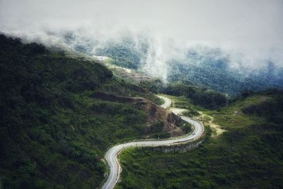 High angle view of road amidst mountains