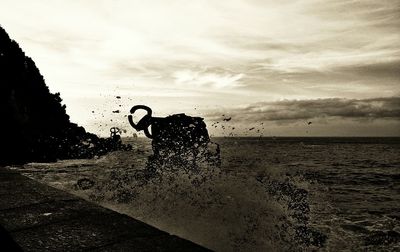 People on beach at sunset