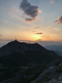 Scenic view of mountains against sky during sunset