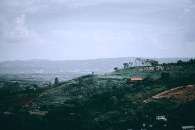 Scenic view of townscape against sky