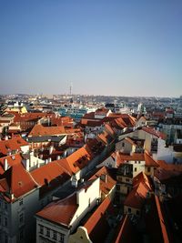 High angle view of cityscape against clear blue sky