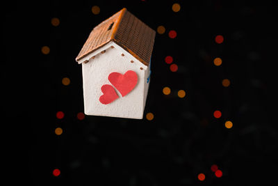 Close-up of heart shape made of christmas lights