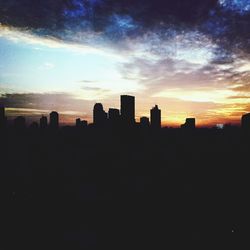 Silhouette of buildings at sunset