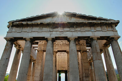 Low angle view of the temple of hephauestus against clear sky