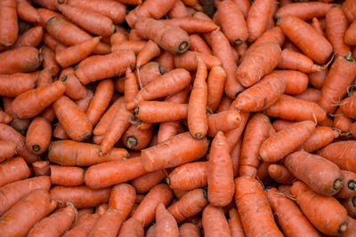 Full frame shot of carrots for sale at market