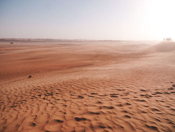 Scenic view of desert against clear sky