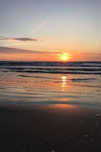 Scenic view of sea at sunset