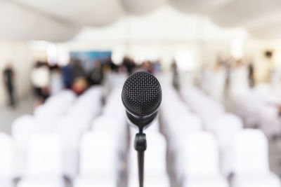 Close-up of microphone at auditorium