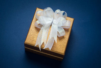 High angle view of christmas decoration against blue background