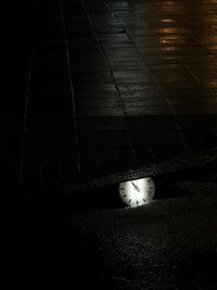High angle view of illuminated ball on road