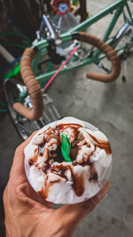 Cropped hand of person holding ice cream